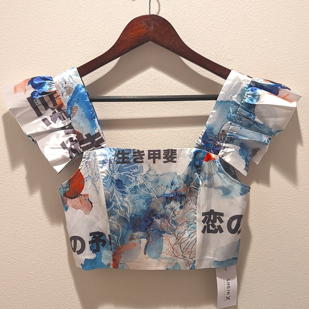 Shein X. NWT. Zip in the back, crop top. blue and white.